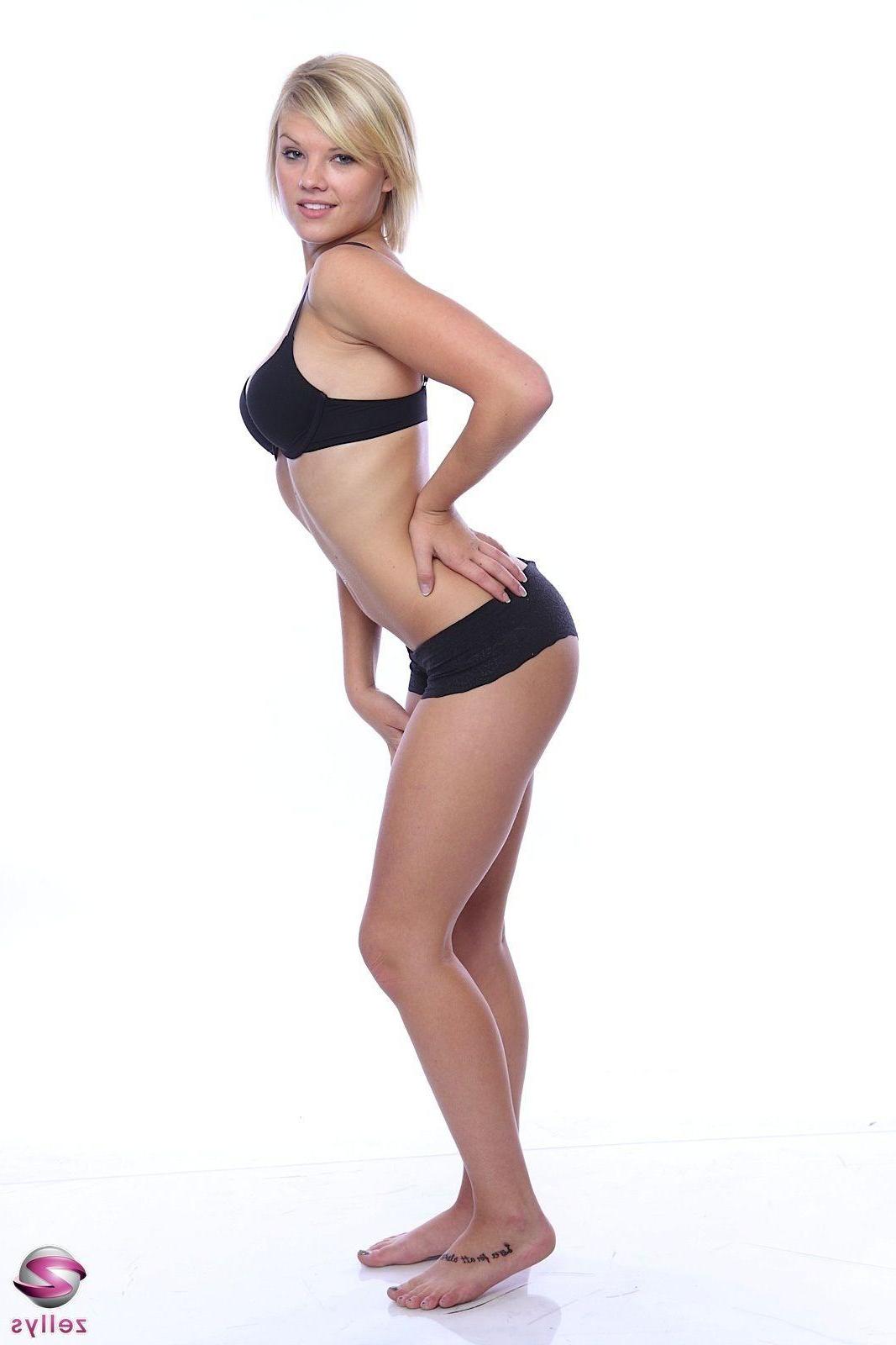 15P Pictures of a blond teen girl teasing the camera