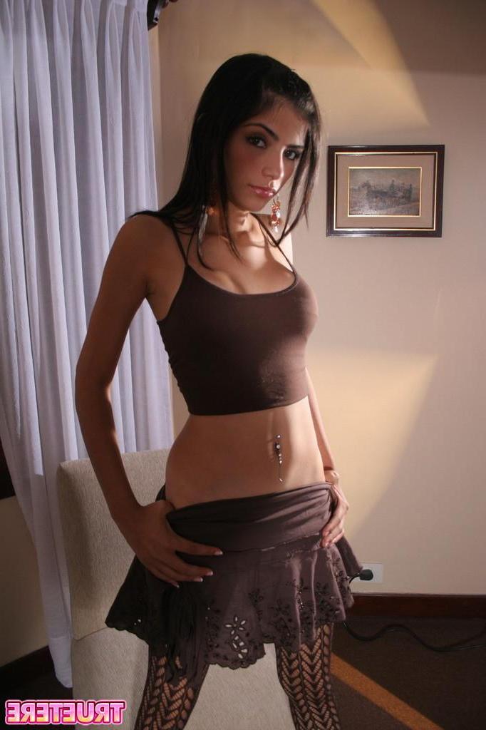 15P Pictures of teen hottie True Tere displaying herself in stockings