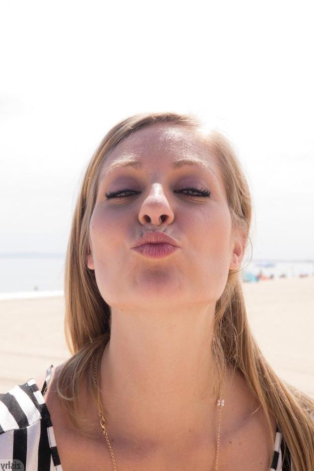 8P Sexy coed Veronica Weston teases outside on a beach