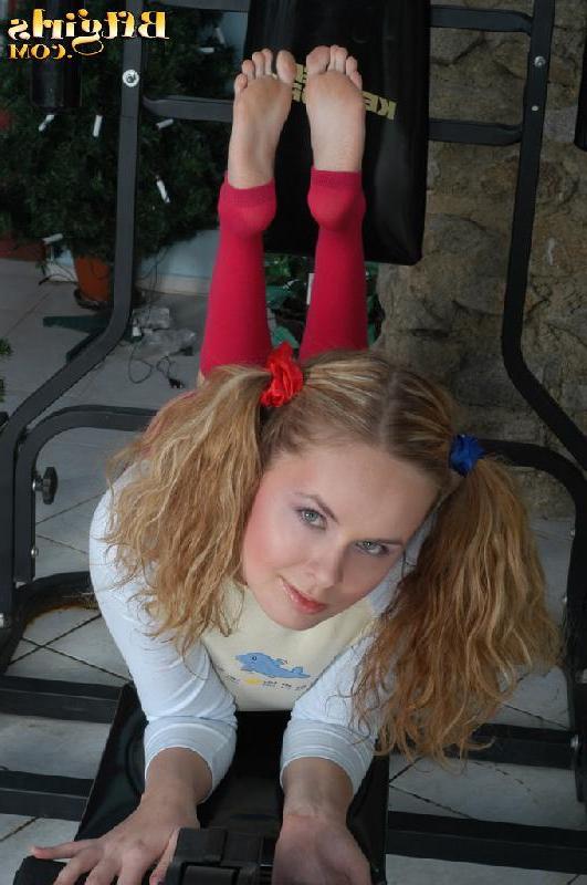 15P Blonde teen in pigtails strips and shows off her feet