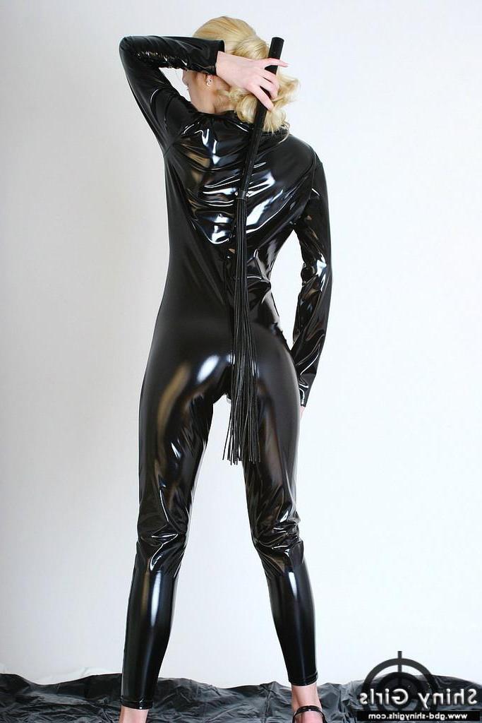 16P Pictures of blonde hottie Kathy dressed in a fullbody black shiny catsuit