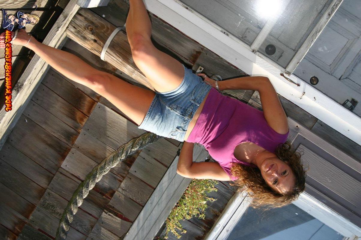 20P Pictures of a coed showing off her hot legs outside