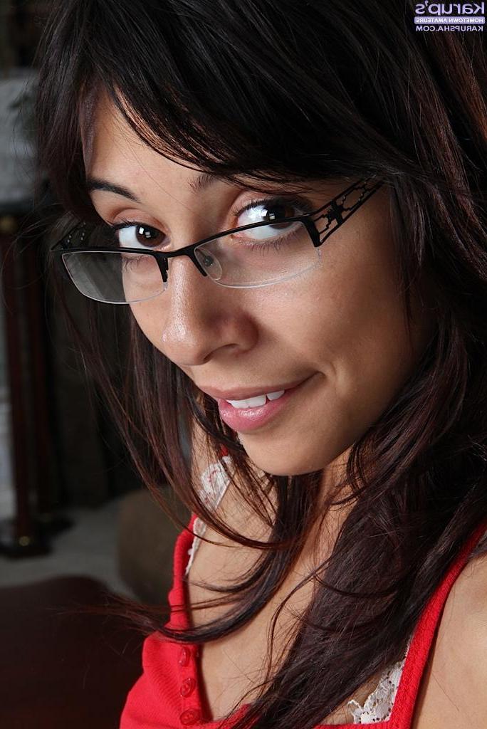 15P Latin coed Rocky takes off her glasses and rubs her shaved pussy