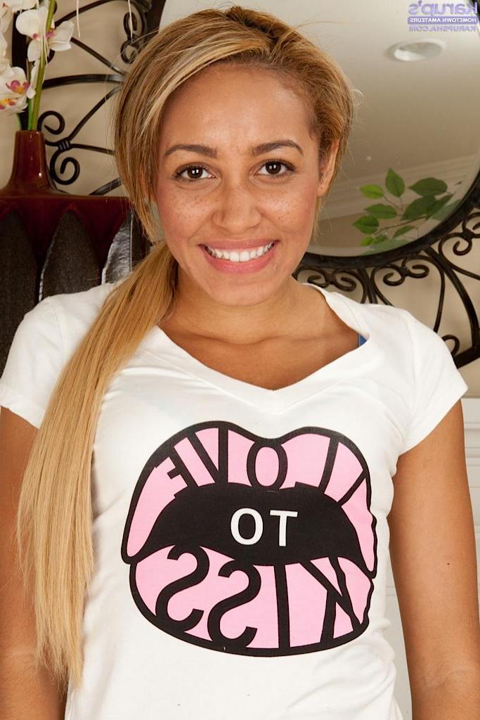 15P Perky coed Tinslee Reagan exposes her hairy pussy