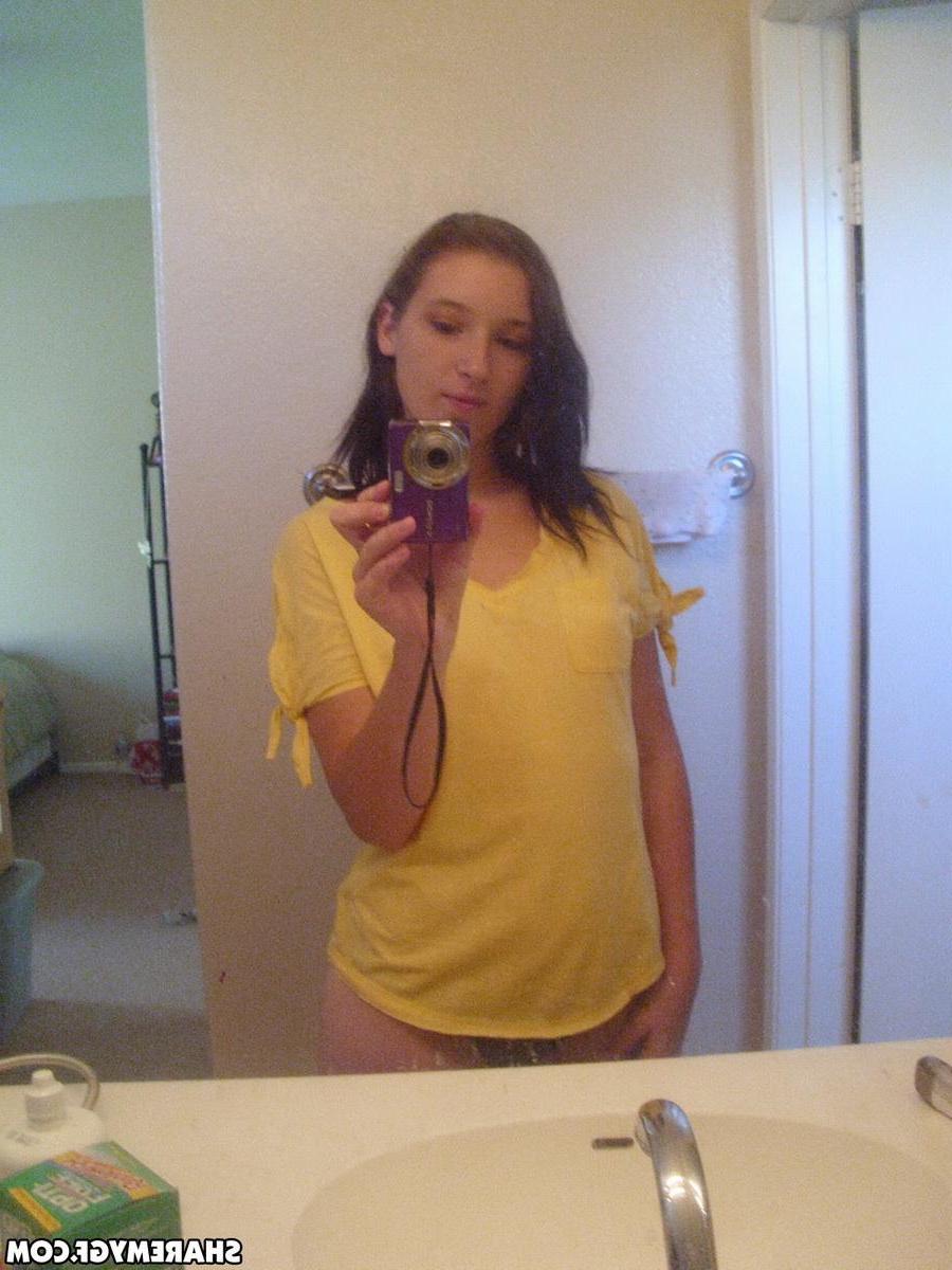 20P Petite brunette coed takes selfies of herself in sheer black panties