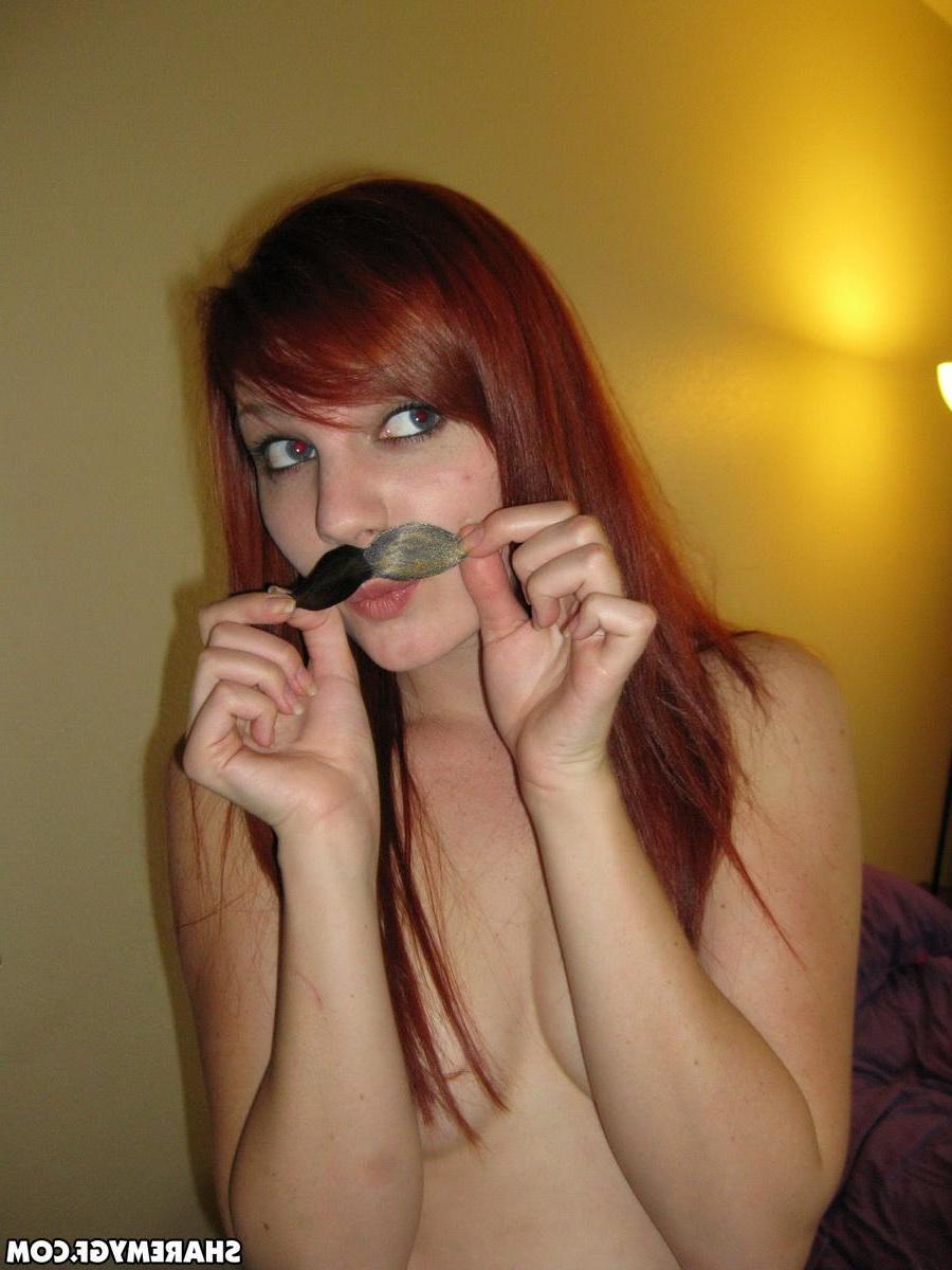 20P Hot redhead coed has some fun around the house