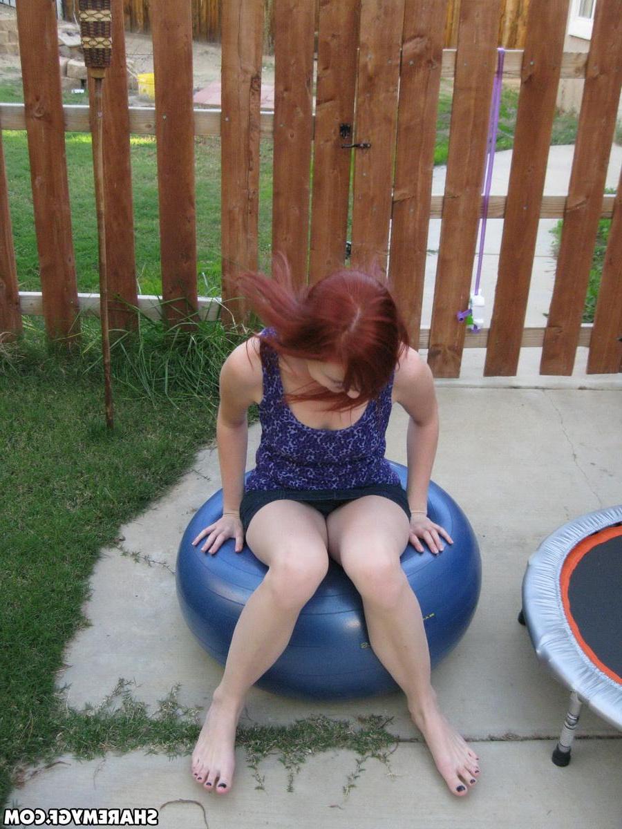 20P Hot redhead coed has some fun around the house