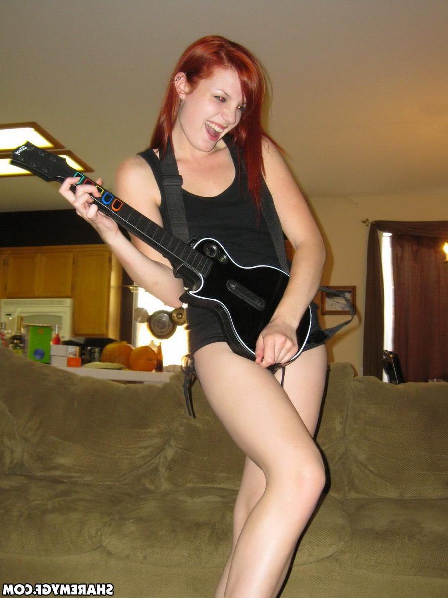 20P Hot redhead coed has some fun around the house