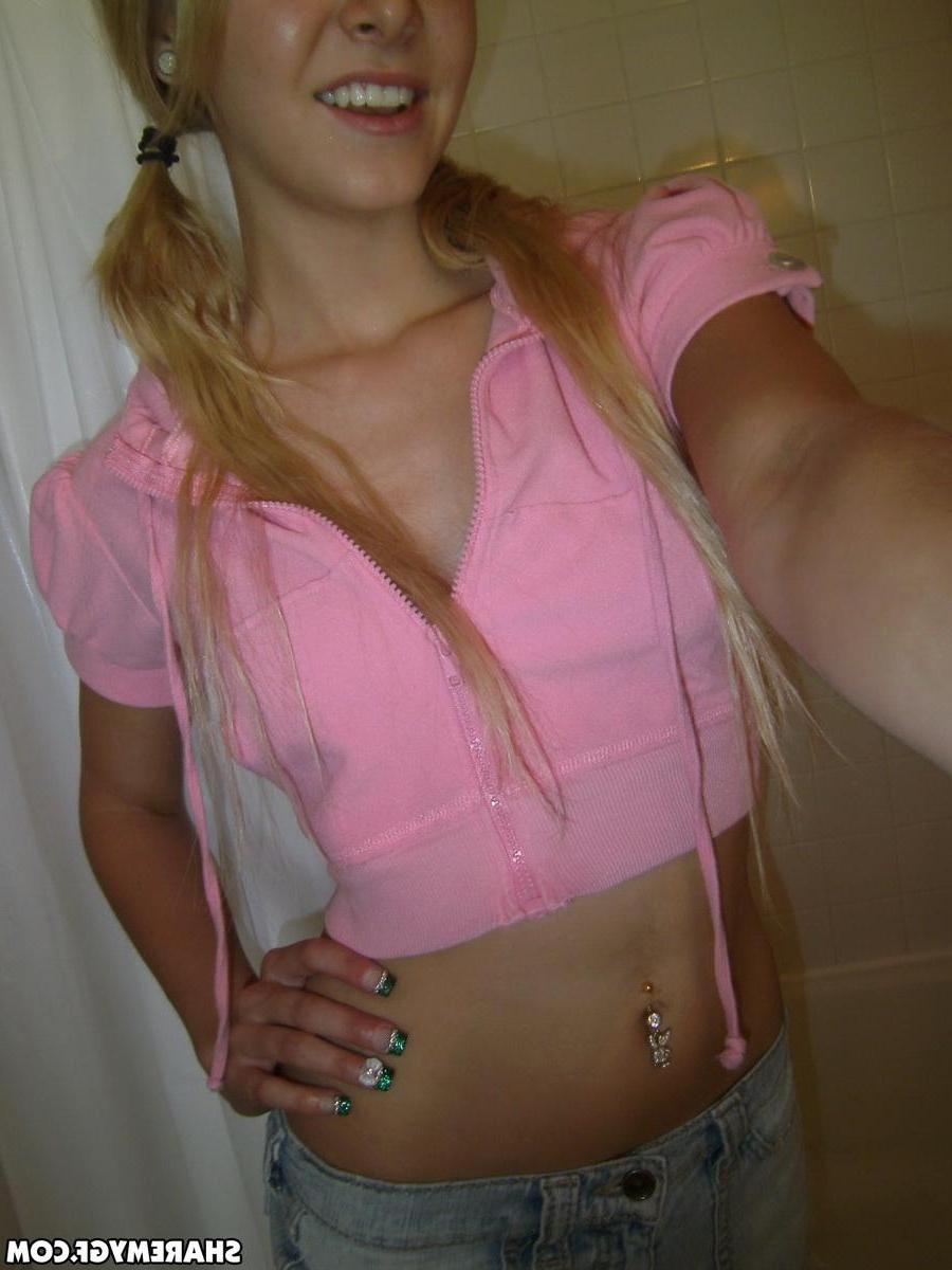 20P Sexy blonde teen flashes her tits and pussy just for you