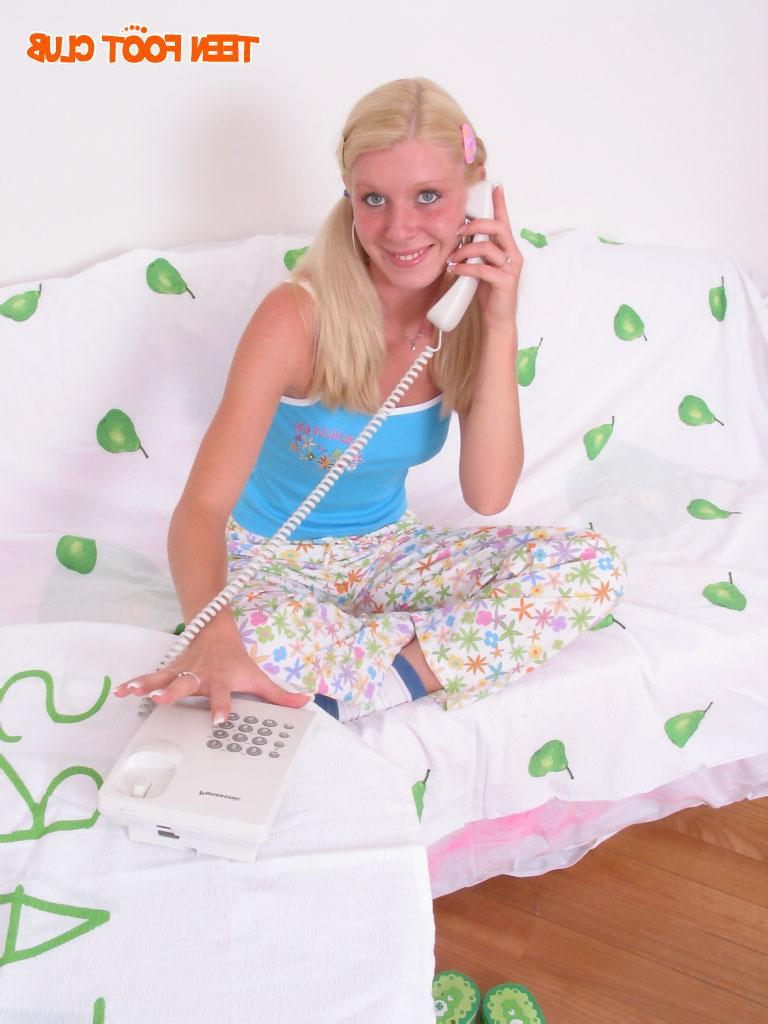 15P Foot loving blonde teen in pigtails teases with her pretty feet