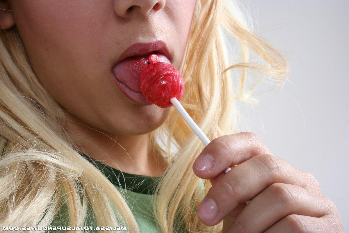 20P Pictures of a busty blonde teen spreading her pussy lips