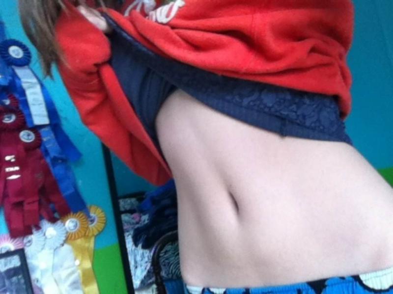 10P Horny teen cutie being a tease on cam by stripping