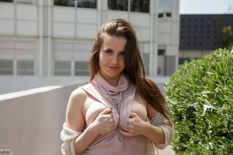 8P Brunette coed Nina Gitch poses and teases in her dress outside