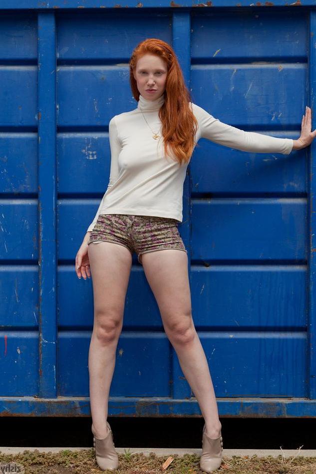 8P Redhead coed Karla Meyers teases on the football field