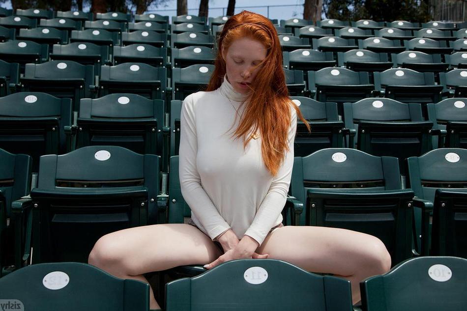 8P Redhead coed Karla Meyers teases on the football field