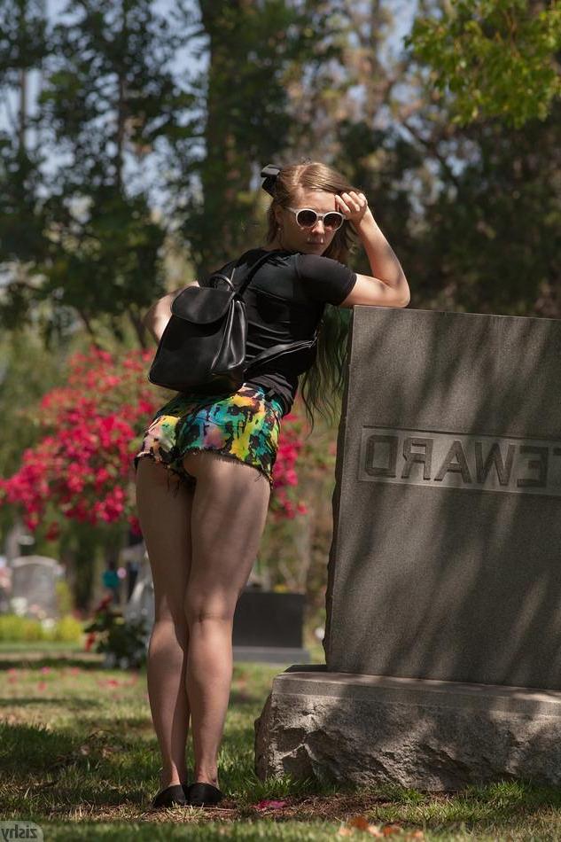 8P Blonde coed Evelyn Bishop teases in a cemetary