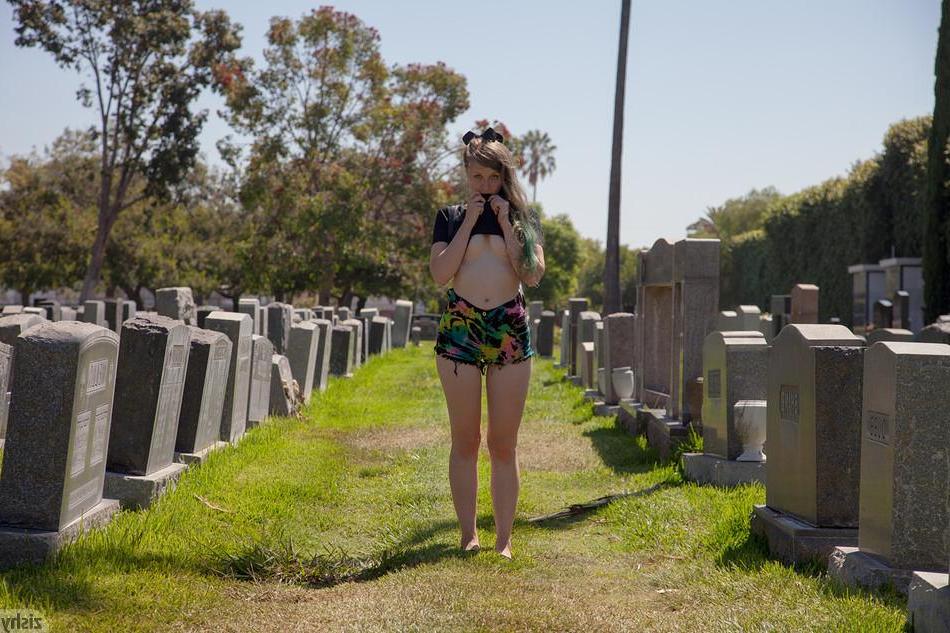 8P Blonde coed Evelyn Bishop teases in a cemetary