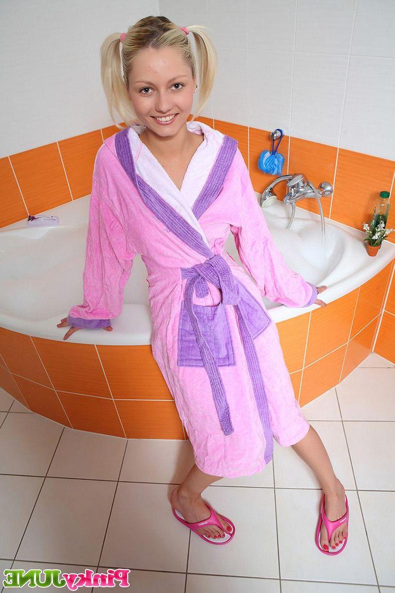 15P Pictures of Pinky June getting all wet for you