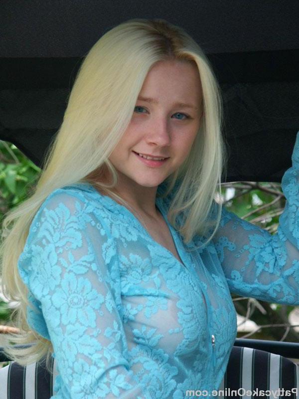 16P Busty blonde teen Patty Cake lounges outside