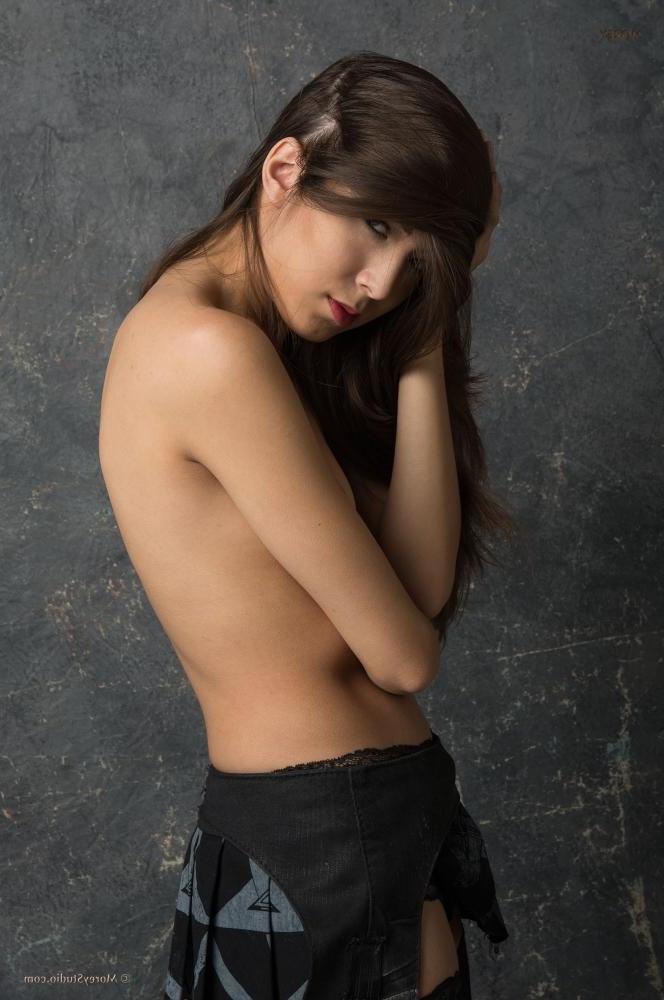 11P Brunette teen Christine poses for you in her black stockings