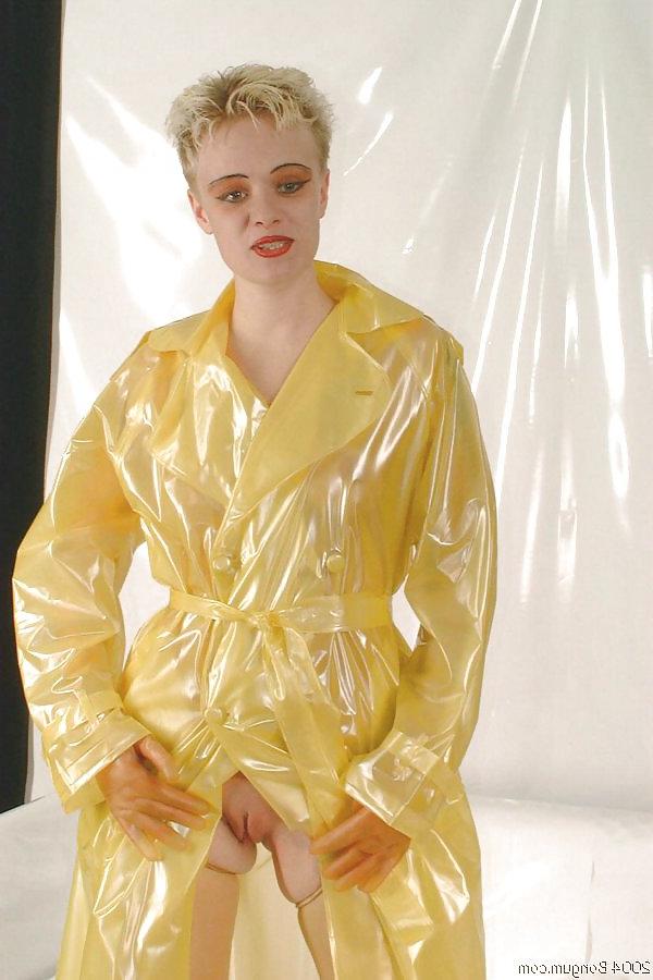 25P Girl in latex raincoat.