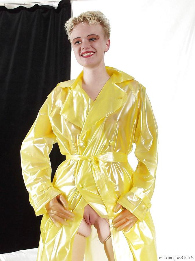 25P Girl in latex raincoat.