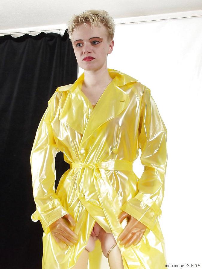 25P Girl in latex raincoat.