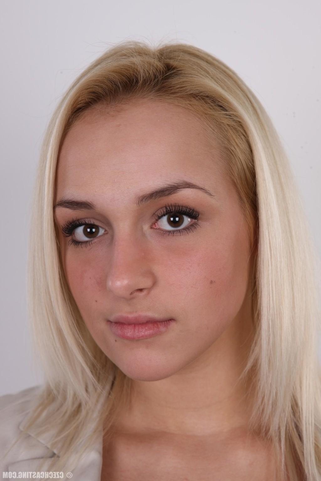 17P Petite blonde model poses naked