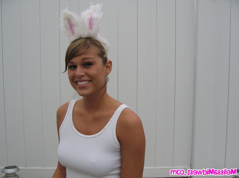 15P Melissa Midwest dressed up like a bunny finding Easter eggs