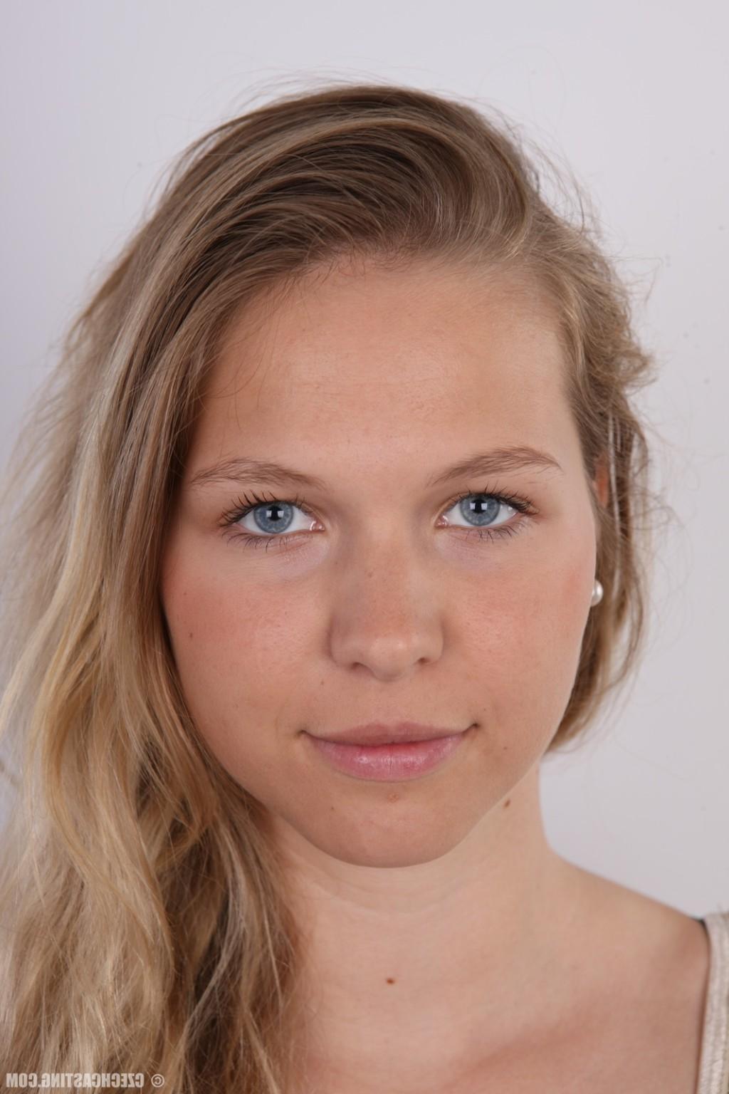 17P Cute teen girl poses for photo camera