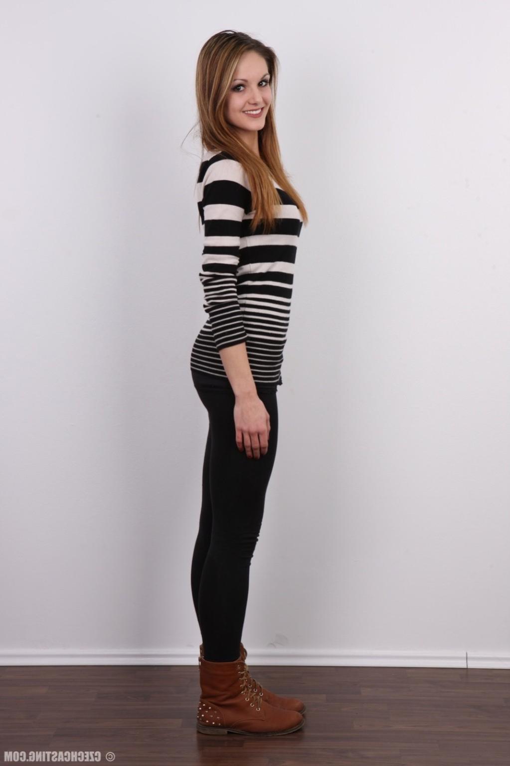 17P Petite teen poses for photo camera