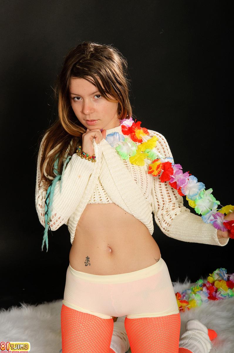 15P Emily 18 wears a sweater, red fishnet pantyhose, and skintight boyshort panties 