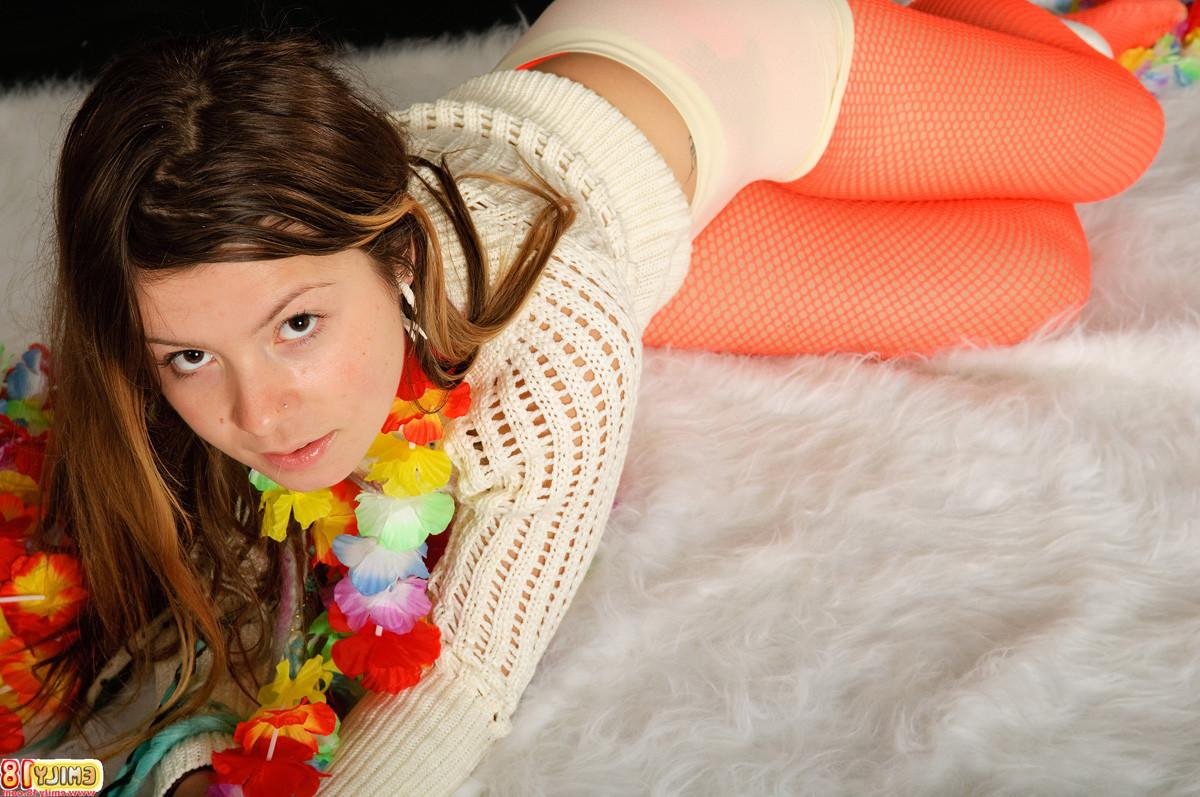 15P Emily 18 wears a sweater, red fishnet pantyhose, and skintight boyshort panties 