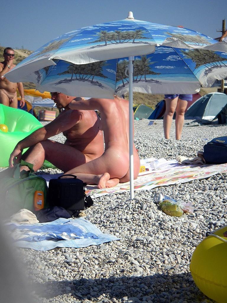 15P Hot amateur nude beach photos