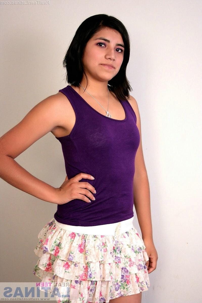 15P Real Latina teen amateur strips and spreads her pussy