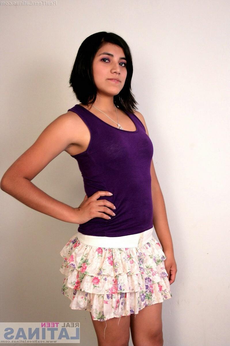 15P Real Latina teen amateur strips and spreads her pussy