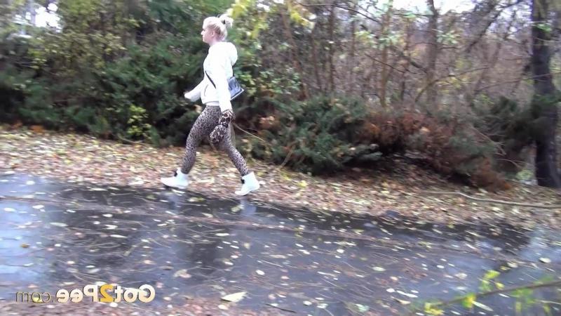 13P Pretty blonde teen pees in public near buildings