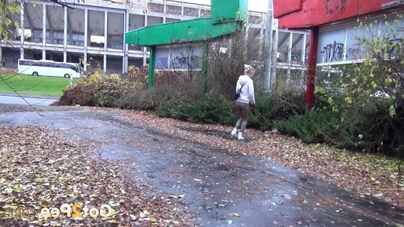 13P Pretty blonde teen pees in public near buildings