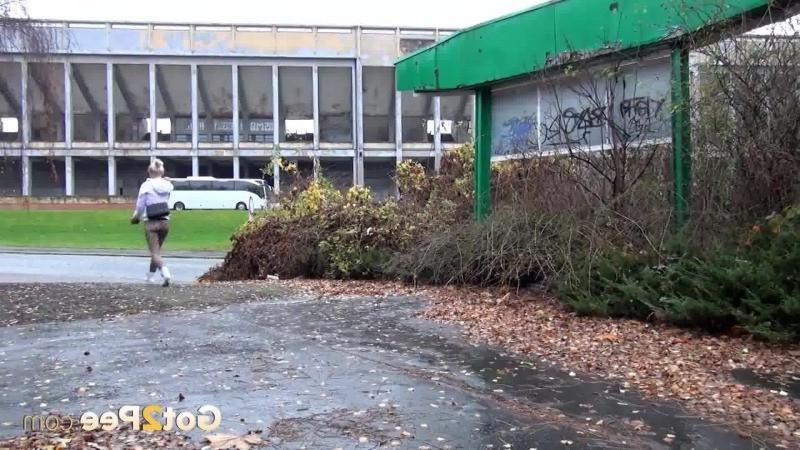 13P Pretty blonde teen pees in public near buildings