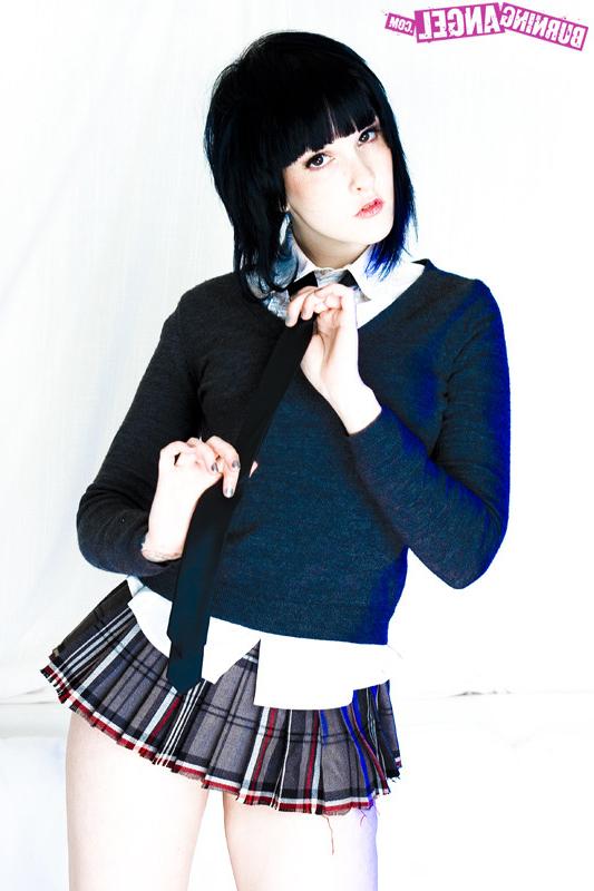 15P Tattooed girl in school girl uniform gets naked