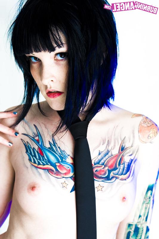15P Tattooed girl in school girl uniform gets naked