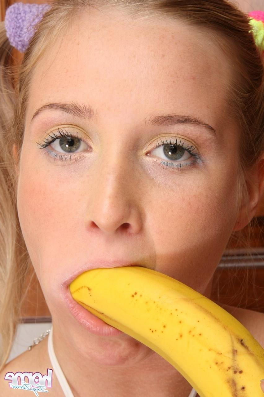 15P Naughty teen girl uses veggies to poke her sweet pussy