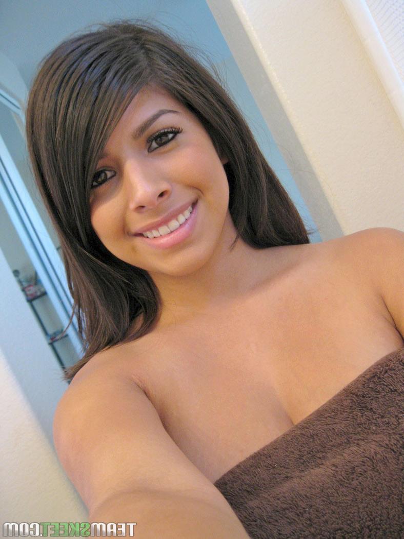 12P Sexy Latina teen girlfriend takes some pics of her nice huge tit