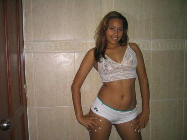 15P Horny Latina chick masturbates