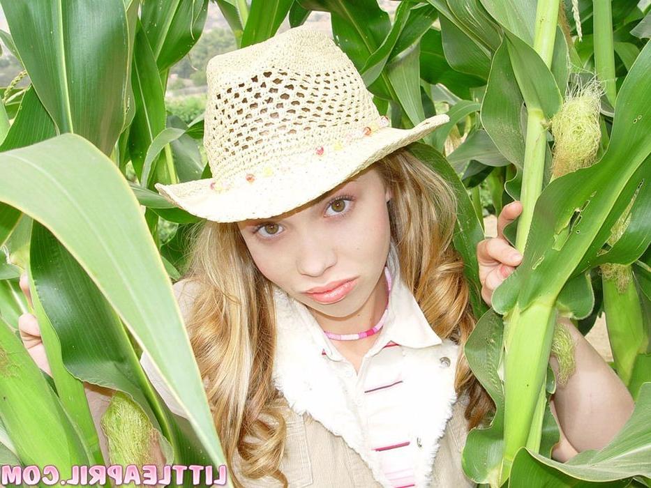 15P Teen with braces having some fun on a cornfield