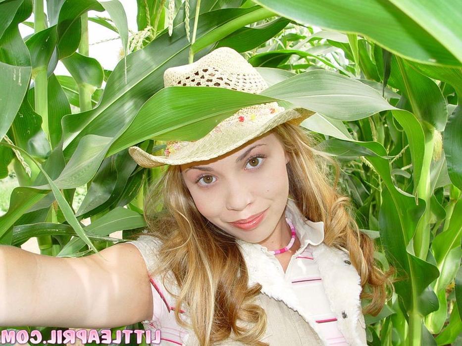 15P Teen with braces having some fun on a cornfield