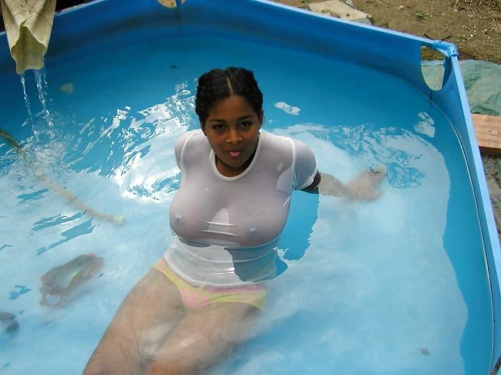 23P BUSTY LATINA IN POOL