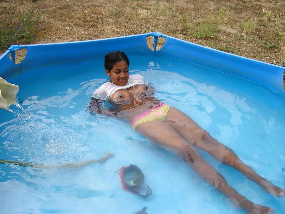 23P BUSTY LATINA IN POOL