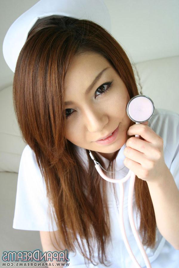 16P Super sexy Japanese Nurse babe in white fishnet stockings