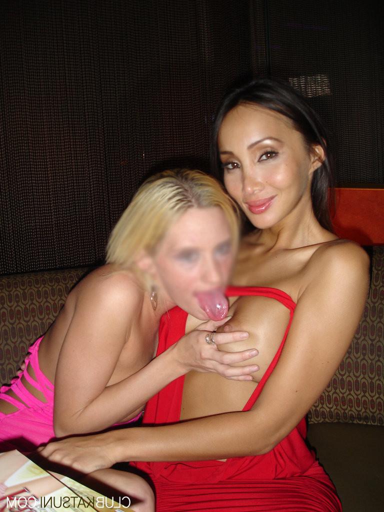 15P Katsuni Strip Dances At Club With A Lucky Lady In This Teasing Photo Set